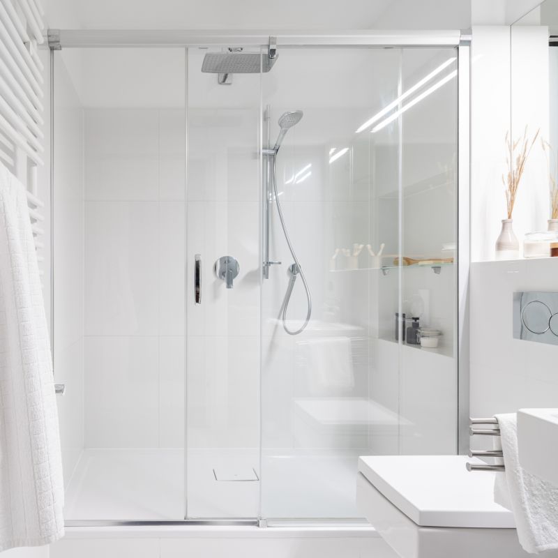 Glass Enclosed Shower with Dark Hardware
